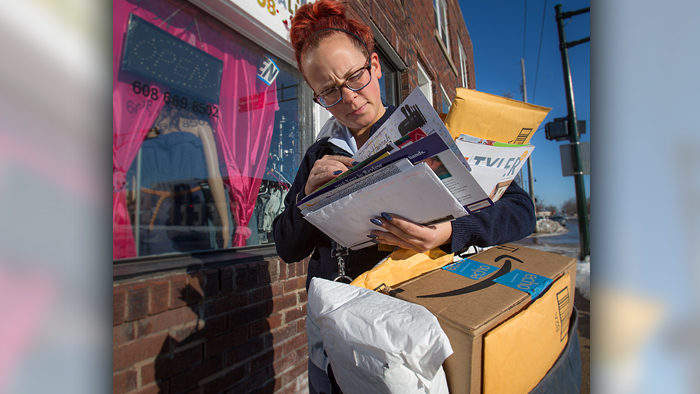 USPS employee delivering packages