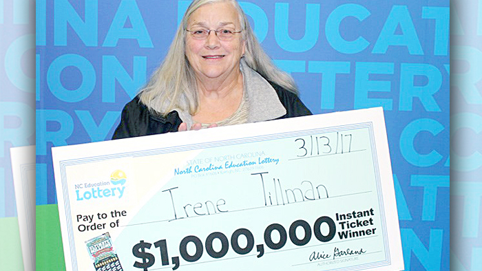 Female USPS holds winning lottery check