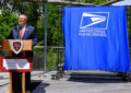 Man speaks at podium