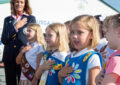 Girl Scouts perform pledge of allegiance