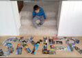 Child looking at postcards