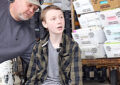 USPS letter carrier and child