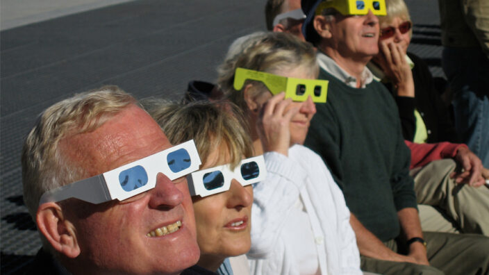 People watch a solar eclipse in Spain in 2015.