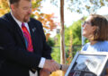 USPS employee presents stamp artwork to Oregon Gov. Kate Brown