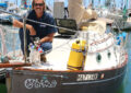 Man and dog on boat