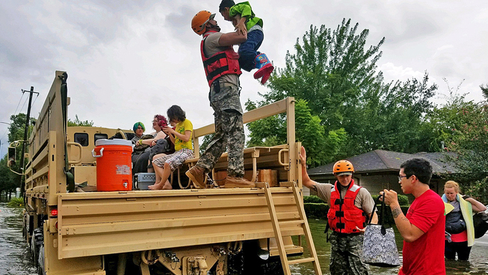 Texas National Guard soldiers assist Houston residents affected by flooding caused by Hurricane Harvey