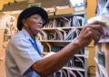 Man sorts mail in Post Office