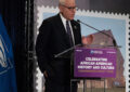 Smithsonian Board Chair David Rubenstein at podium