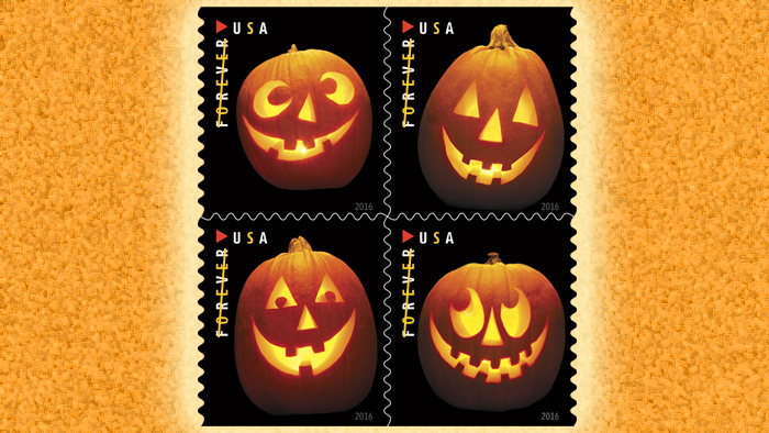 Four jack-o-lantern stamps on orange backgroun