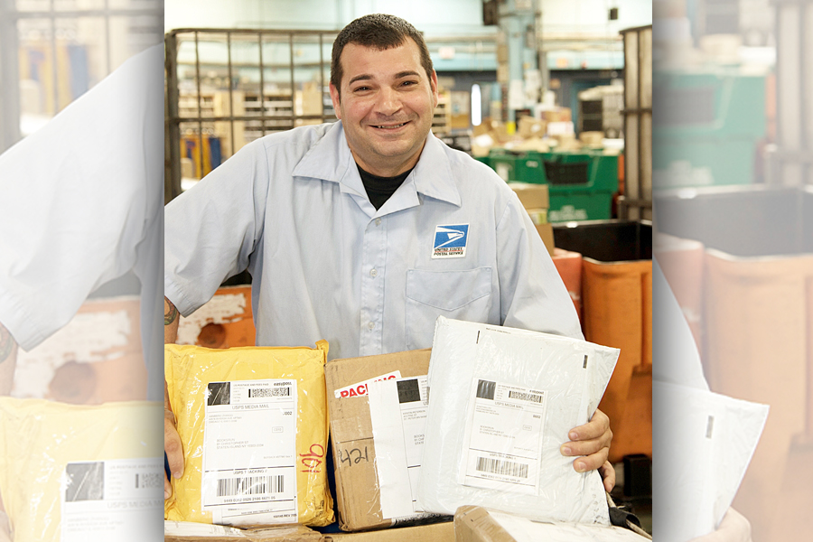 Employee posing with parcels