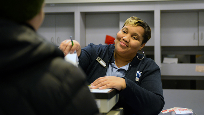 Female retail clerk with customer