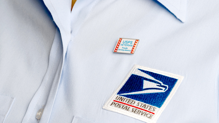 USPS uniform with veterans day pin