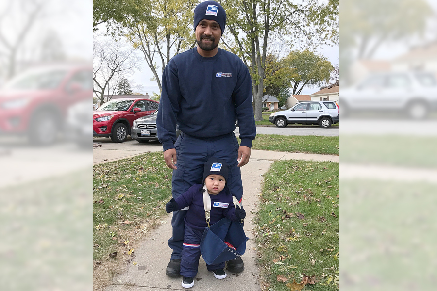 Letter carrier and his 10-month old son