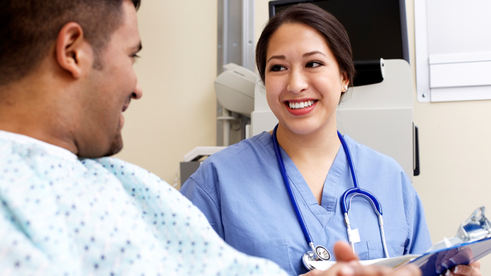 Female nurse with male patient