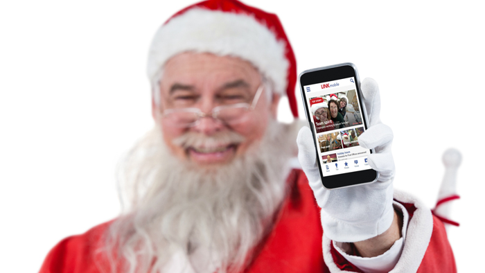Santa holds up phone