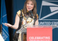 Woman speaks at podium