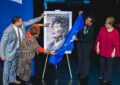 People unveil Lena Horne stamp poster on stage