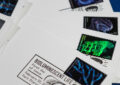 Bioluminescent Life stamps affixed to envelopes