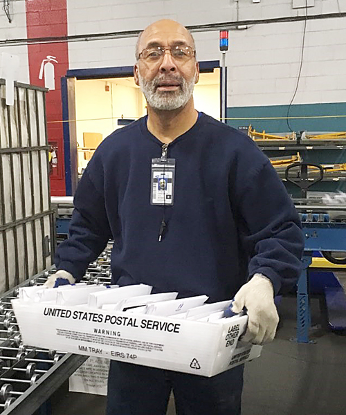 Elijah Hairston, a mail handler at the Delaware Processing and Distribution Center