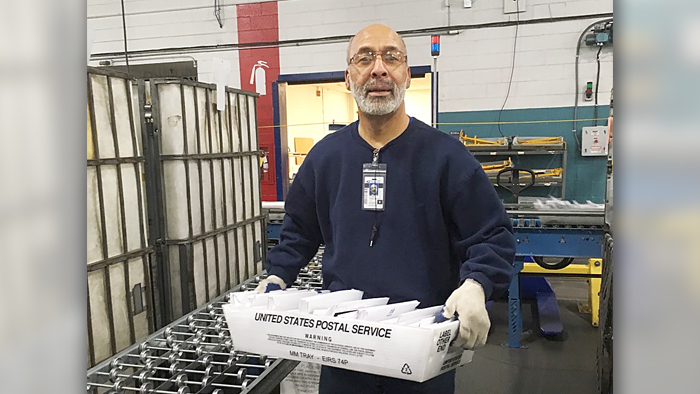Elijah Hairston, a mail handler at the Delaware Processing and Distribution Center