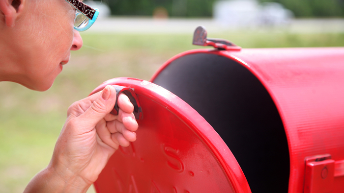 Customer opens mailbox