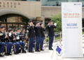 Military band performs on plaza