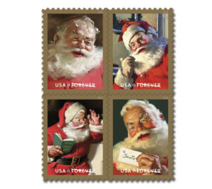 Four stamps showing Santa Claus