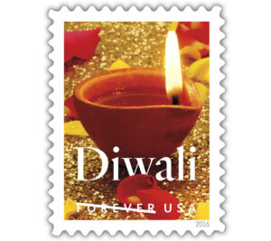 Stamp showing lit candle