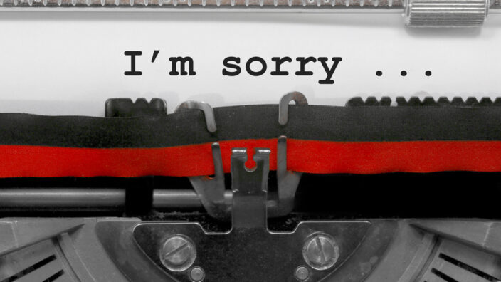 Apology letter in typewriter