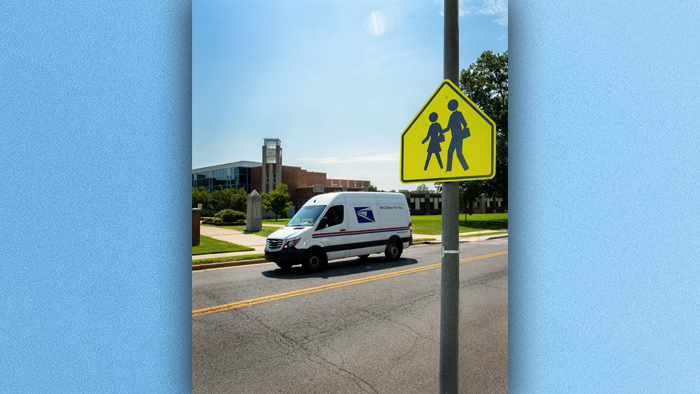 LLV driving in school zone