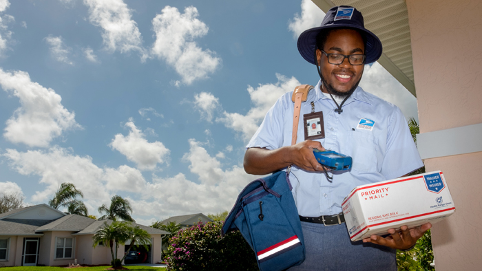 Employee holding package