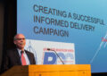 Man at lectern