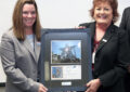 Two women with award