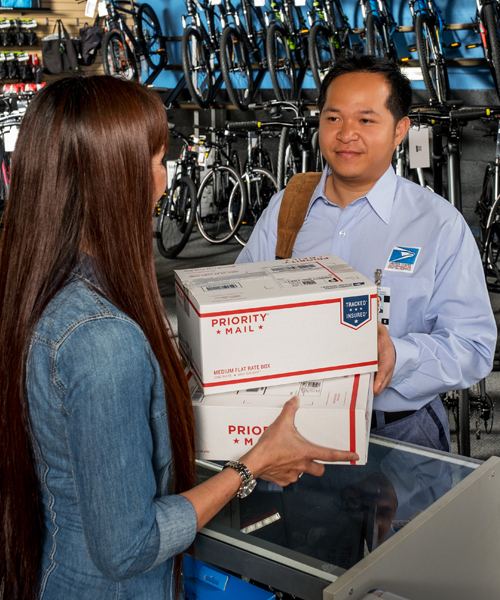 Letter carrier delivers packages