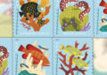 Stamp showing illustrations of sea life surrounding corals