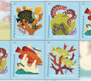 Stamp showing illustrations of sea life surrounding corals