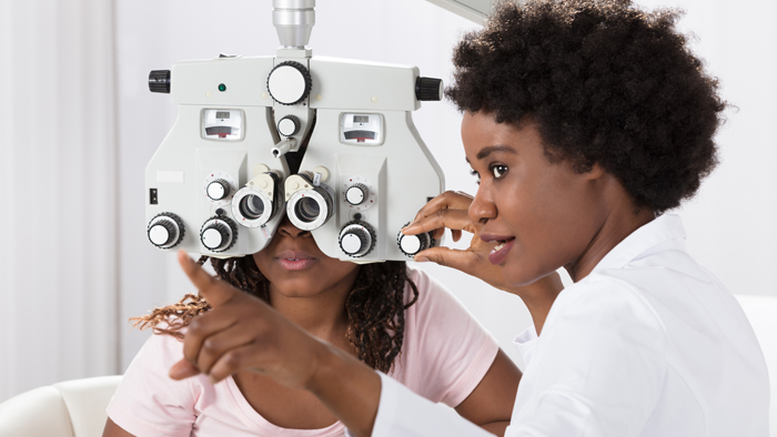 A woman gets an eye examination