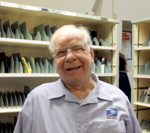 Alan Cunningham, a Wichita, KS, letter carrier, smiles