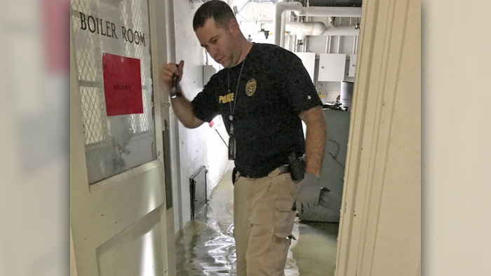Postal Inspector Steve Cohen checks out the basement at the Red Springs, NC, Post Office