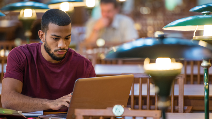 Student working on a laptop