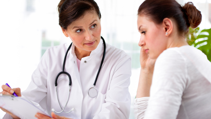 Woman talking to her doctor