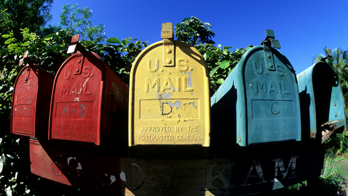 Red, yellow and blue mailboxes