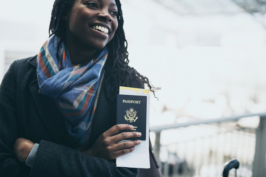 Woman holds passport