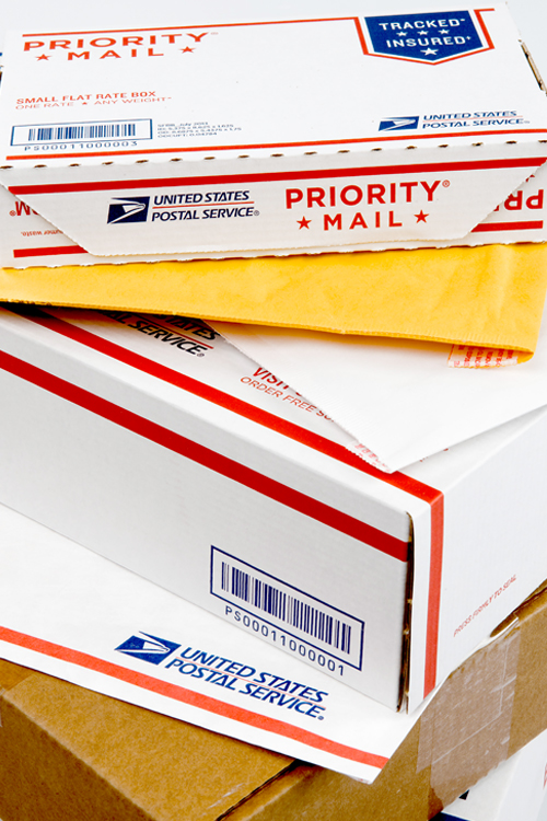 Stack of USPS-branded packages