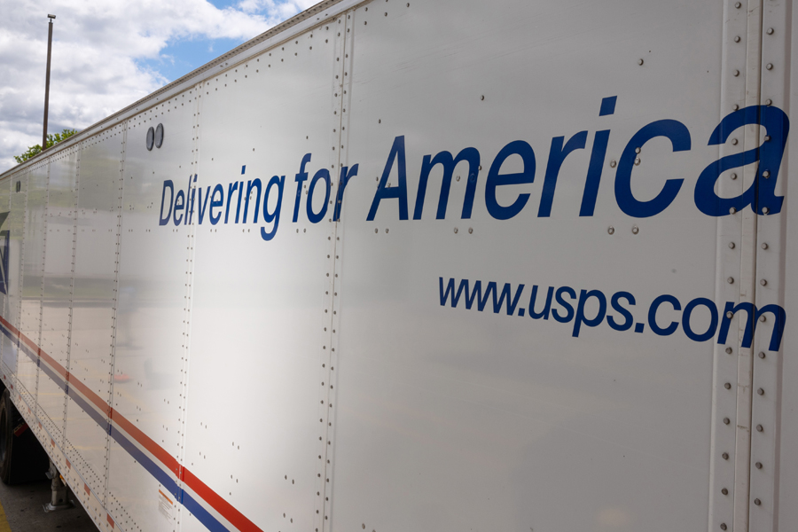 A USPS tractor-trailer