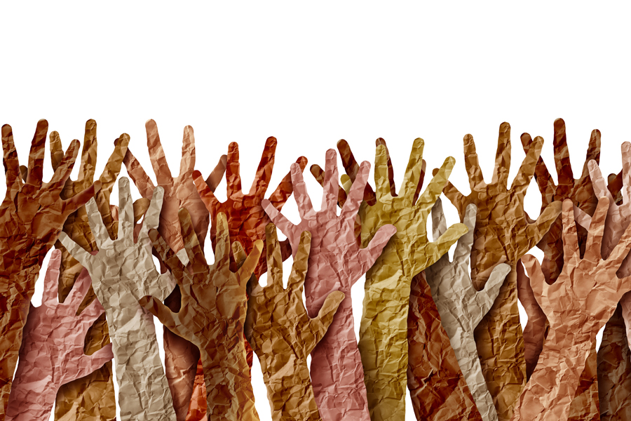 A collage of paper hands shapes in several colors