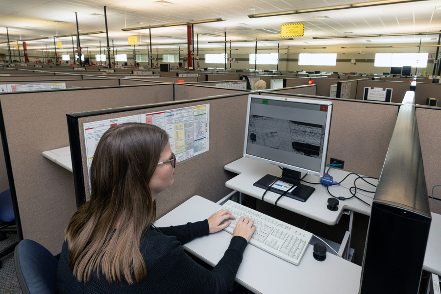 A data conversion operator work at the USPS Remote Encoding Center in Salt Lake City