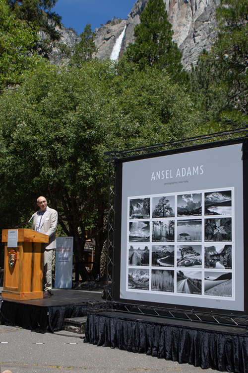 Matthew Adams, the artist’s grandson, speaks during the Ansel Adams stamp dedication ceremony.