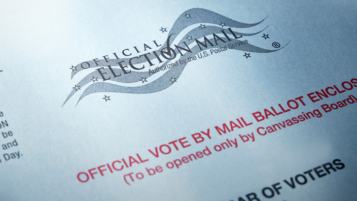 A stamped envelope indicating an official vote by mail ballot