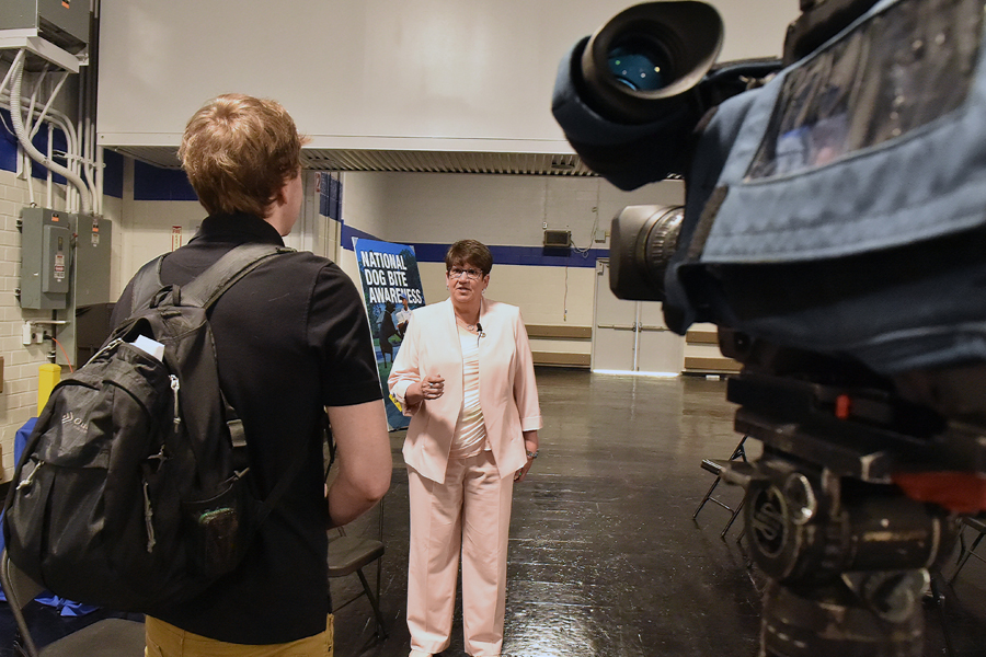 Linda DeCarlo, the Postal Service’s occupational safety and health senior director, speaks to a TV news crew at the May 30 news conference.